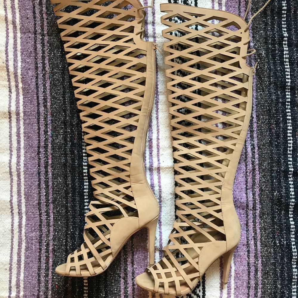 Tan, above the knee, caged heels.